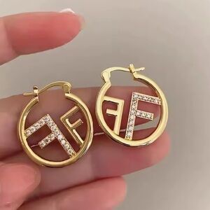 Gold and Silver Logo Hoop Earrings
